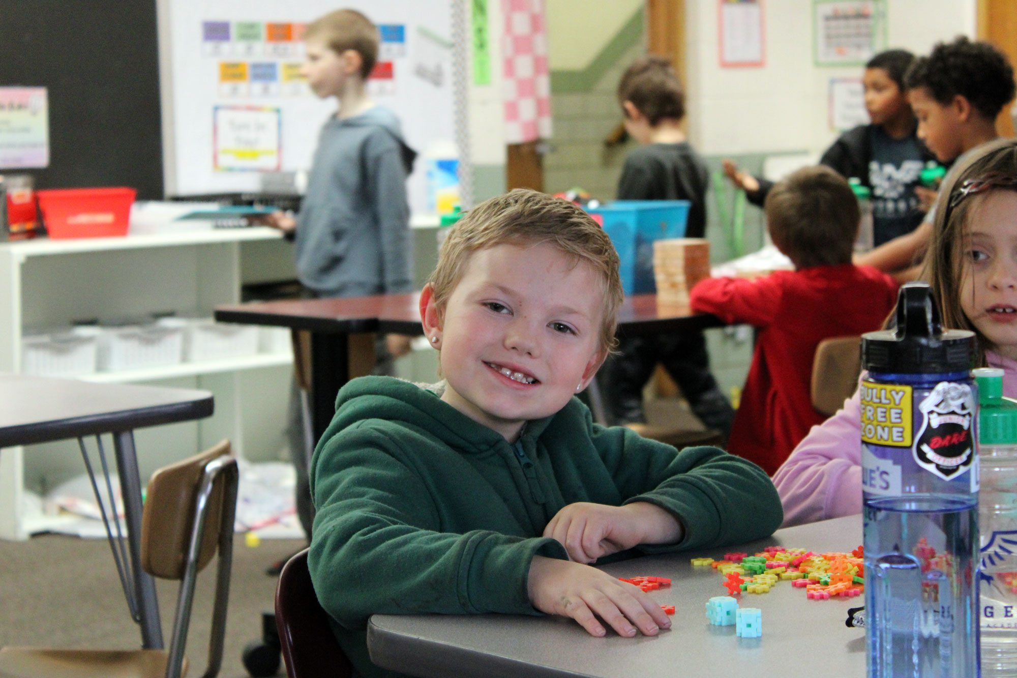 elementary student learning with blocks